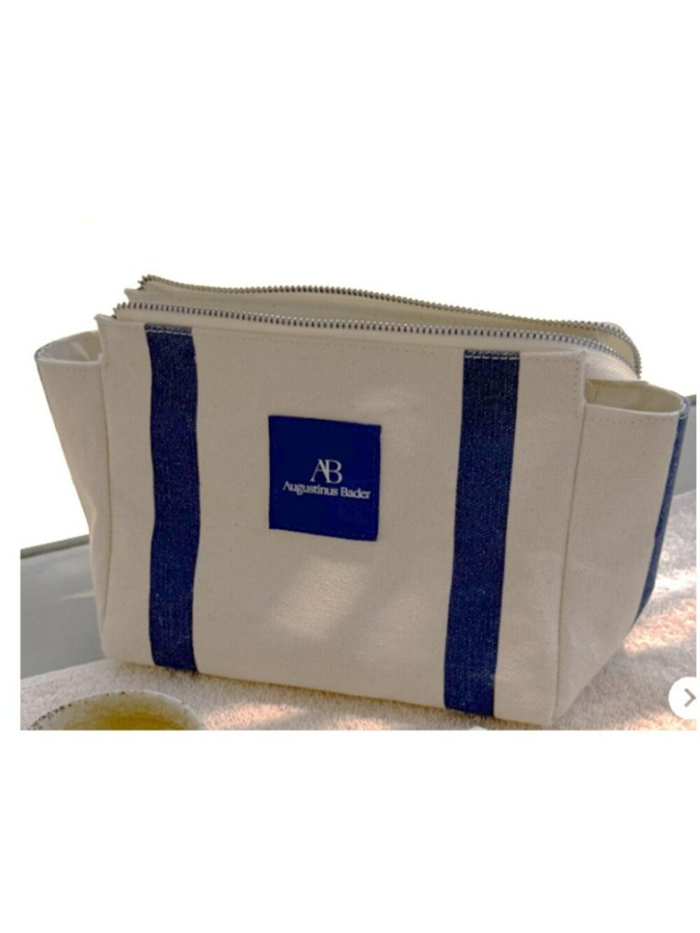 Augustinus Bader cream & blue striped canvas cosmetic bag makeup travel pouch